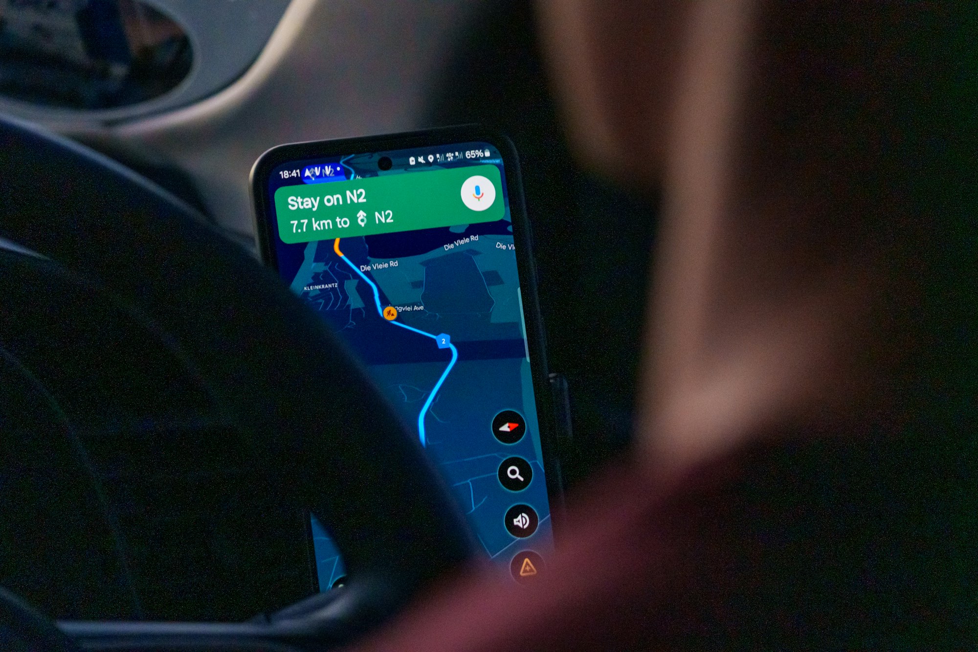 A phone showing a route to a nearby business