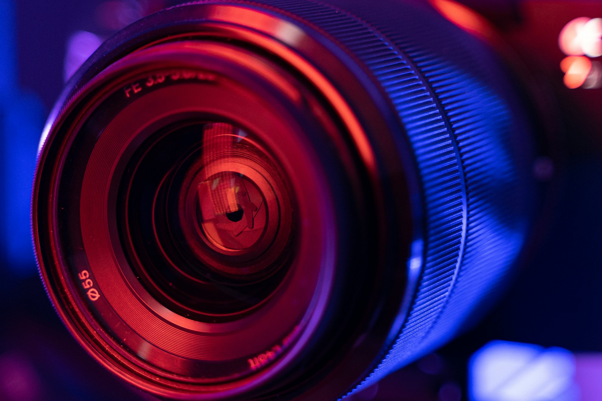 A camera lens resting on a table